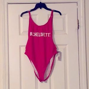 Women’s XL bright pink one piece swimsuit.